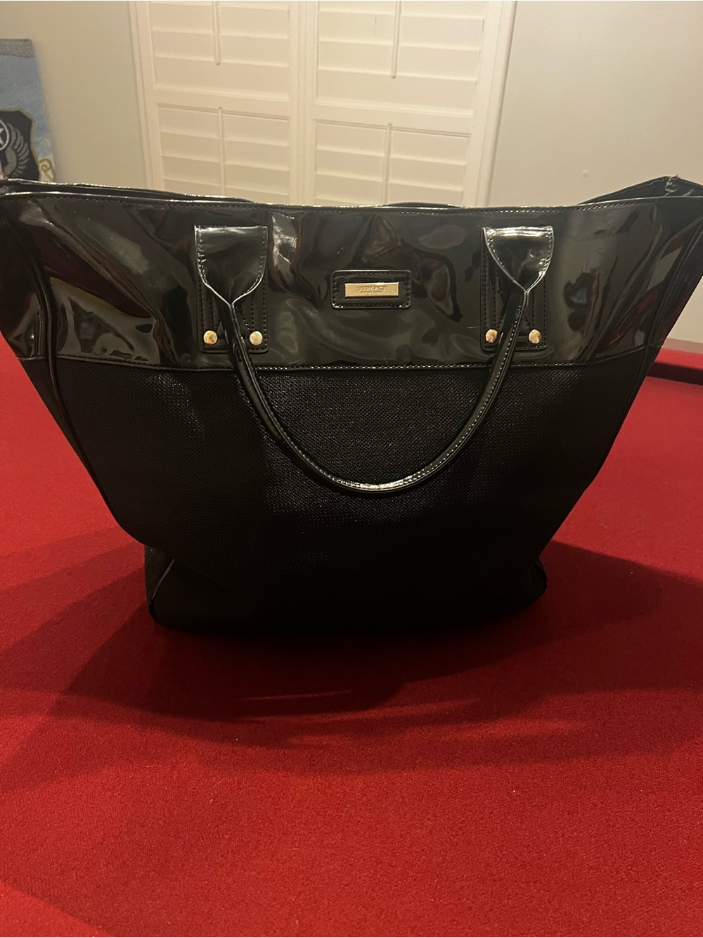 Versace Tote Black Mesh, Gold-Tone Hardware
Faux Patent Leather Trim